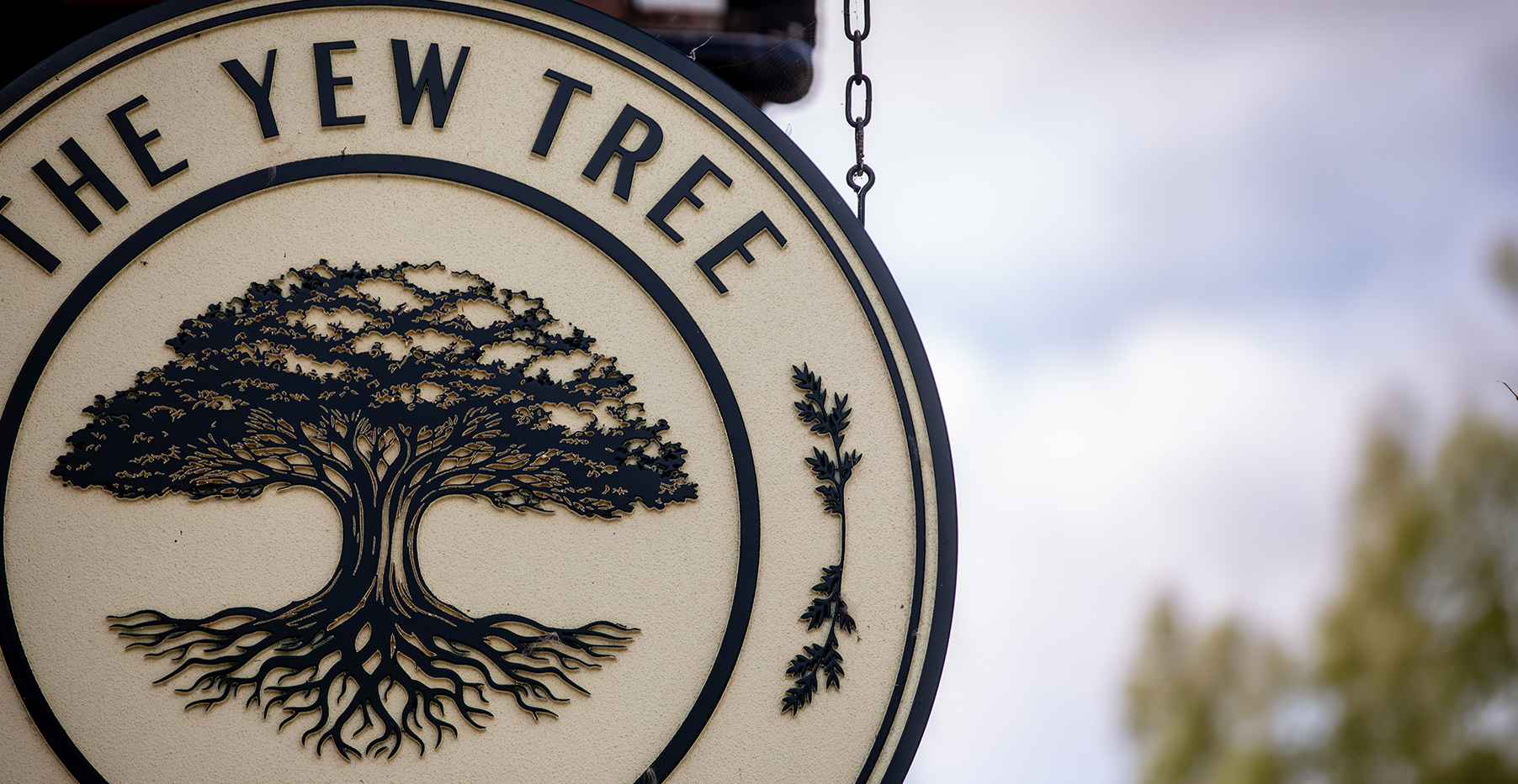 The Yew Tree Inn sign