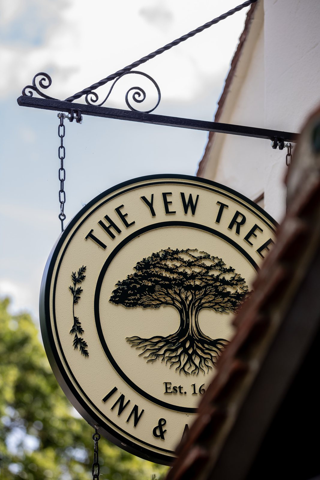 The Yew Tree Inn & Acreage sign
